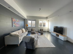 TruRetreats Design Loft für 8 Personen I Riesige Küche I eCharger I 65z SmartTV I 150qm